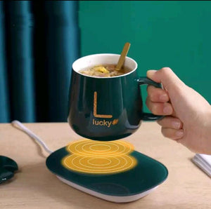 Taza con base calentadora